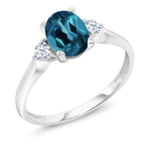 Gem Stone King 10K White Gold London Blue Topaz and White Created Sapphire 3-Stone Women's Ring (1.40 Cttw, Gemstone Birthstone, Available In Size 5, 6, 7, 8, 9)