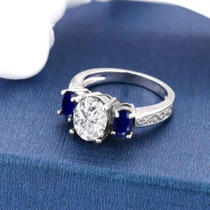 Gem Stone King 925 Sterling Silver White Moissanite and Blue Sapphire 3-Stone Ring For Women (3.21 Cttw, Available in size 5, 6, 7, 8, 9)