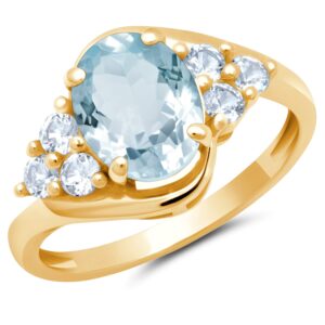 MAX + STONE Blue Aquamarine Oval Sunburst Halo Ring for Women in 10k Yellow Gold with Created White Sapphire and March Birthstone Anniversary Ring Size 7