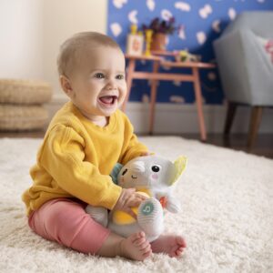 Bright Starts Hug-a-Bye Baby Elephant Stuffed Animal Musical Toy, Soft Toy Soother Plays Songs & Lights up, Newborn and up