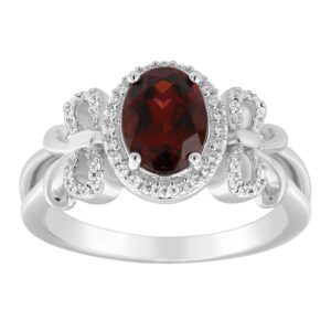 Jewelili Enchanted Disney Fine Jewelry Sterling Silver 8x6 MM Oval Cut Red Garnet and 1/6 Cttw Natural White Round Diamonds Snow White Bow Ring Size 5