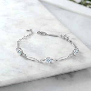 Gem Stone King 925 Sterling Silver Sky Blue Aquamarine and White Created Sapphire Tennis Bracelet For Women | 3.32 Cttw | Gemstone March Birthstone | Oval 7X5MM | 6 Inch + 1 Inch Extender