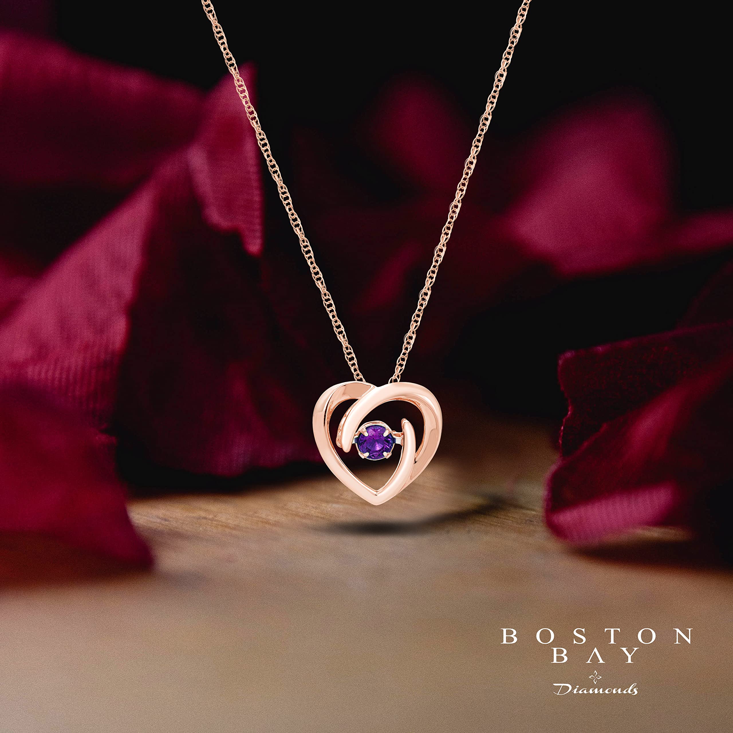 Boston Bay Diamonds 14K Rose Gold Plated .925 Sterling Silver & Amethyst Heart Swirl Brilliance in Motion Gemstone Pendant Necklace with Rope Chain - 18”