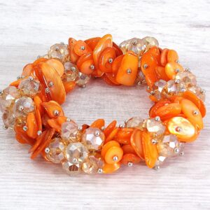 Calisa Designs Woman's orange shell and glass beaded stretch bracelet with silver beads, Designed with clusters of orange shell and orange facet cut glass beads.