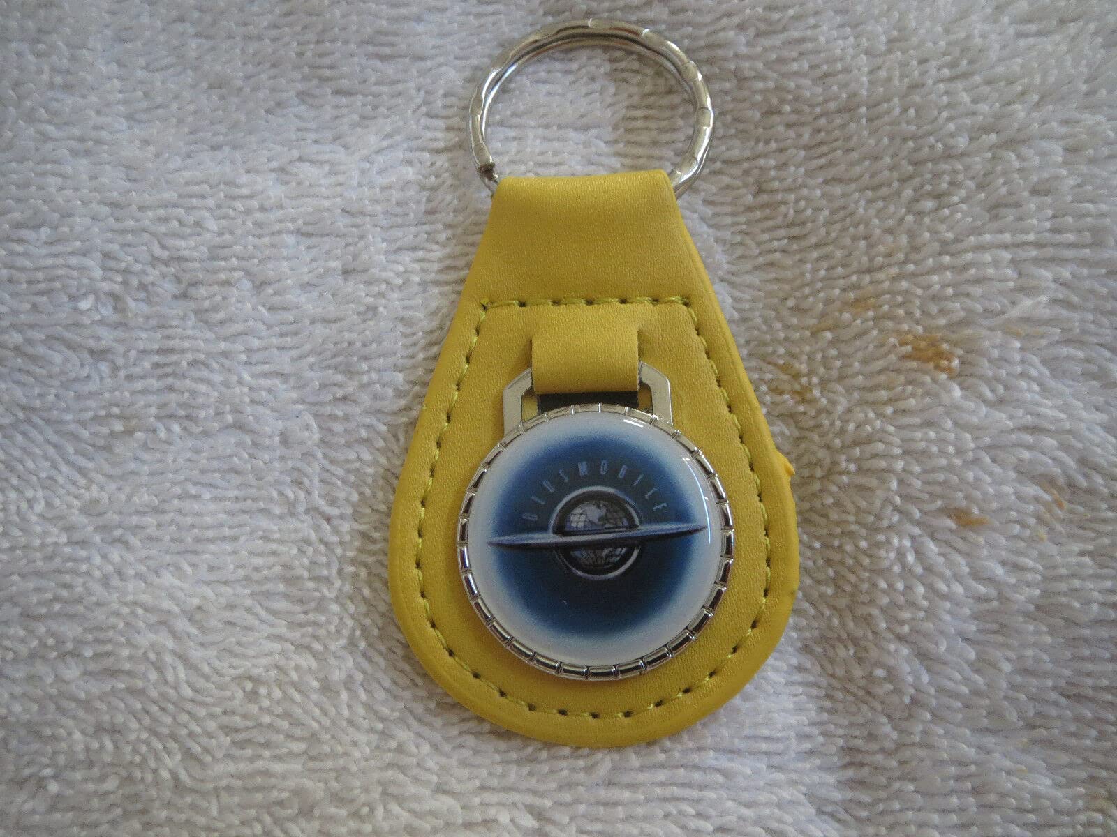 1930's 1940's 1950's OLDS WORLD VINTAGE LOGO LEATHER KEYCHAIN - YELLOW