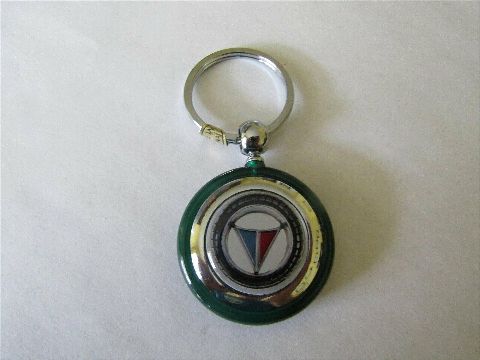 VALIANT LOGO EMBLEM ROUND PLASTIC KEYCHAIN - GREEN