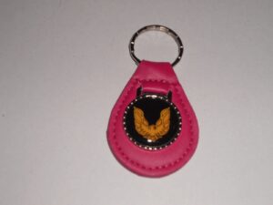 firebird or trans-am gold bird logo leather keychain - magenta