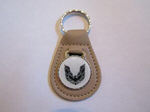 firebird or trans-am black bird logo leather keychain - beige