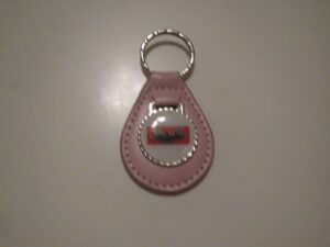 1962 1963 1964 galaxie 390 bird white red & gold logo leather keychain - pink