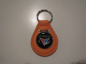 1960's belvedere savoy plaza fury vip valiant blue & red logo leather keychain - pumpkin