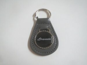 1975 1976 1977 1978 1979 1980 1981 1982 granada script logo leather keychain - dark grey