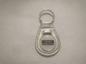 1967 1968 1969 1970 cougar cat logo emblem plaque leather keychain - silver