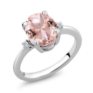 gem stone king 925 sterling silver peach nano morganite and white topaz 3 stone ring for women (2.36 cttw, oval 10x8mm, gemstone october birthstone, size 6)