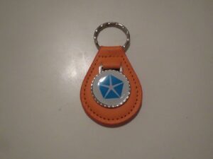 newport new yorker 300 lebaron lhs laser white logo leather keychain - pumpkin