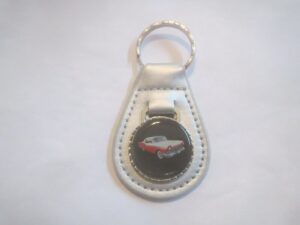 1957 fairlane sunliner red & white car logo leather keychain - silver