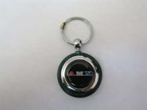 amx a-m-x emblem logo round plastic keychain - green