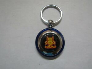 gremlin man logo round plastic keychain - blue