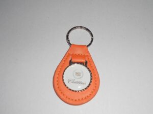 eldorado seville deville fleetwood calais allante logo leather keychain - pumpkin