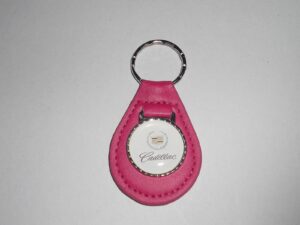 eldorado seville deville fleetwood calais allante logo leather keychain - magenta