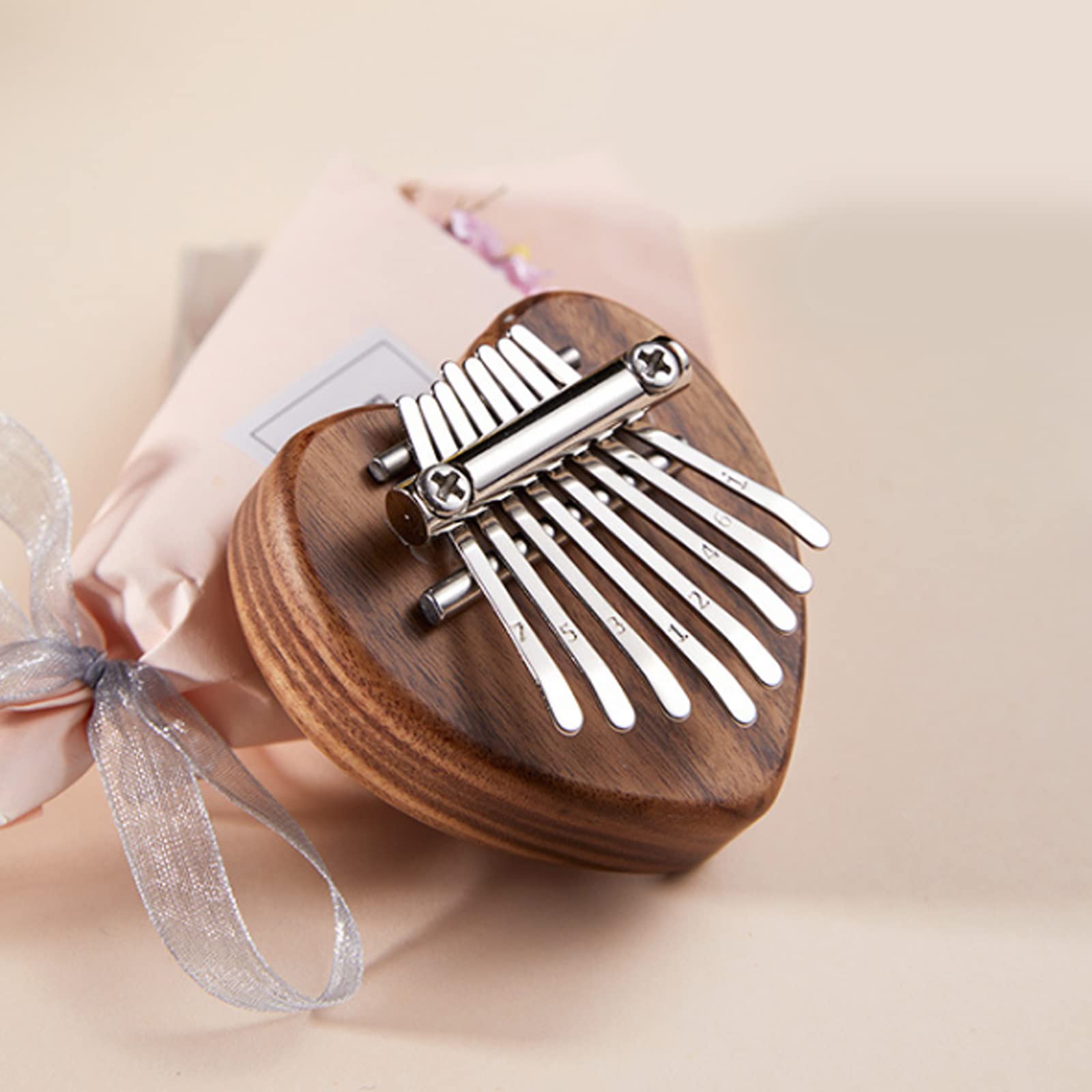 ANXVERS 8 Key Kalimba Thumb Piano，Mini Thumb Piano, Delicate Finger Piano, Heart-Shaped Finger Piano Decompression, Music Accessories, Pendant Gifts, Portable Mini Piano for Children and Beginners