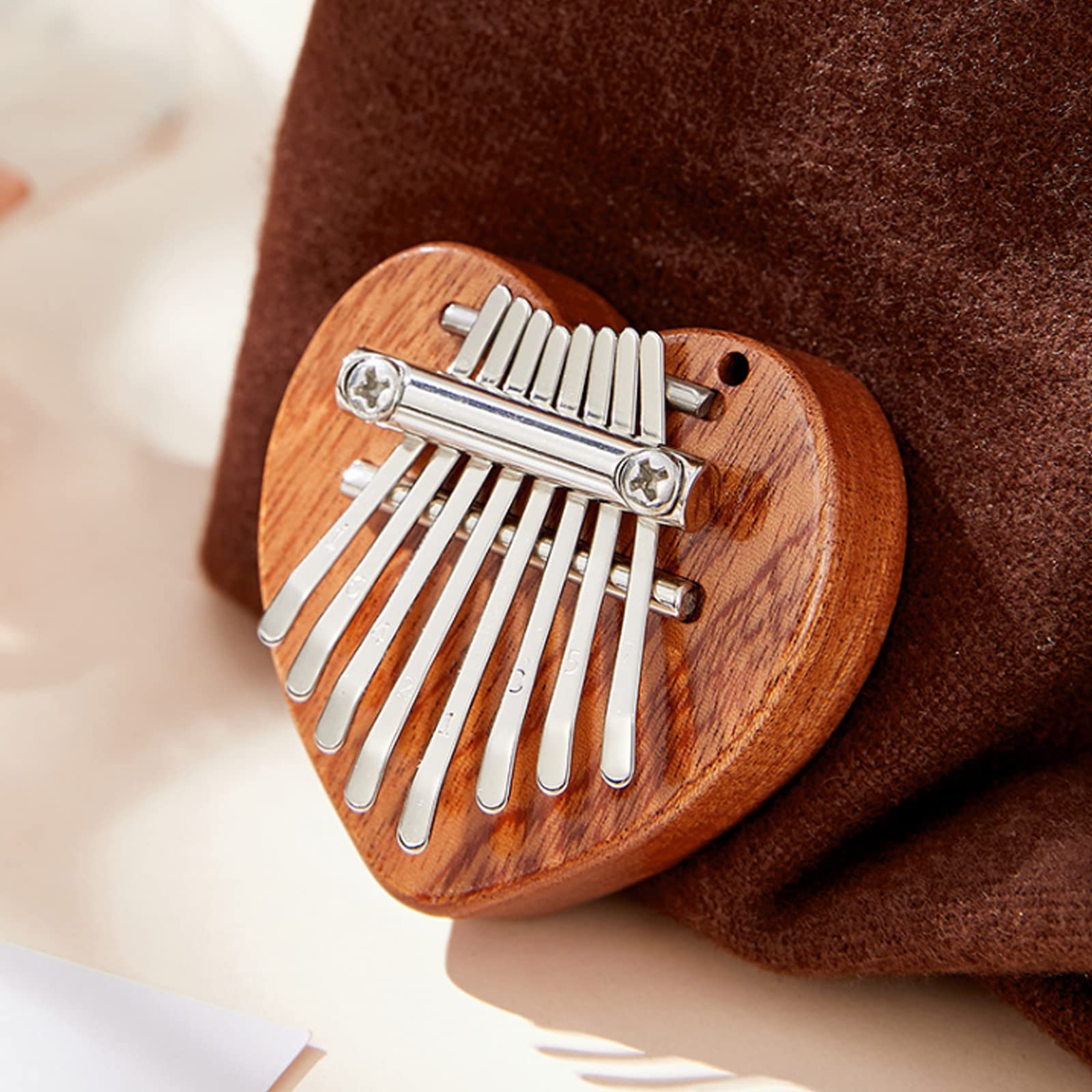 ANXVERS 8 Key Kalimba Thumb Piano，Mini Thumb Piano, Delicate Finger Piano, Heart-Shaped Finger Piano Decompression, Music Accessories, Pendant Gifts, Portable Mini Piano for Children and Beginners