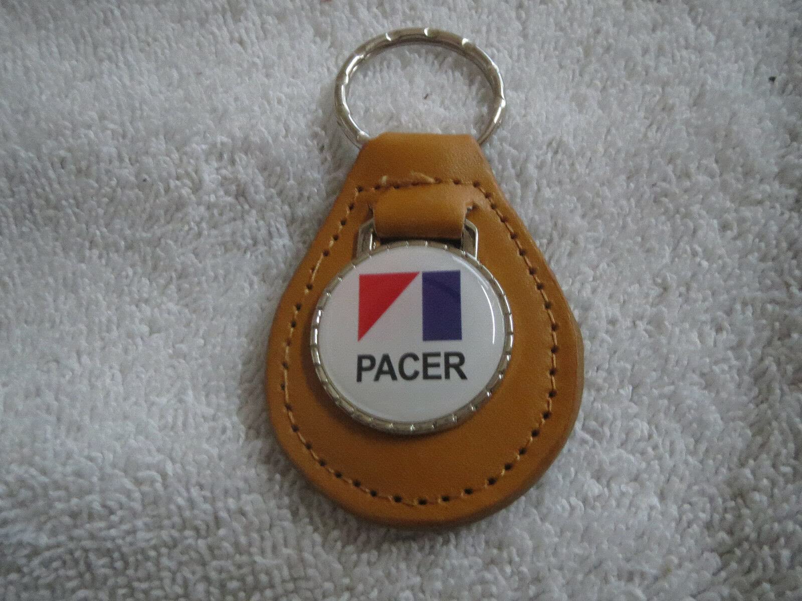 1975 1976 1977 1978 1979 AMC PACER LOGO EMBLEM LEATHER KEYCHAIN - ORANGE