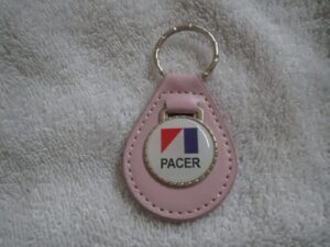 1975 1976 1977 1978 1979 amc pacer logo emblem leather keychain - pink