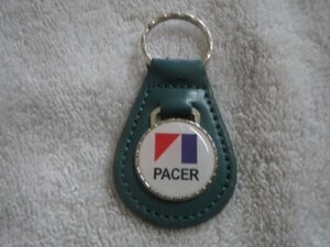 1975 1976 1977 1978 1979 amc pacer logo emblem leather keychain - teal