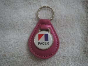 1975 1976 1977 1978 1979 amc pacer emblem leather keychain - magenta