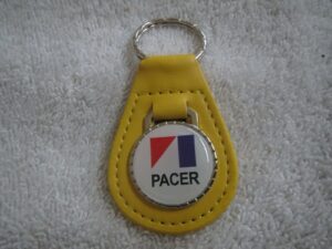 1975 1976 1977 1978 1979 amc pacer logo emblem leather keychain - yellow