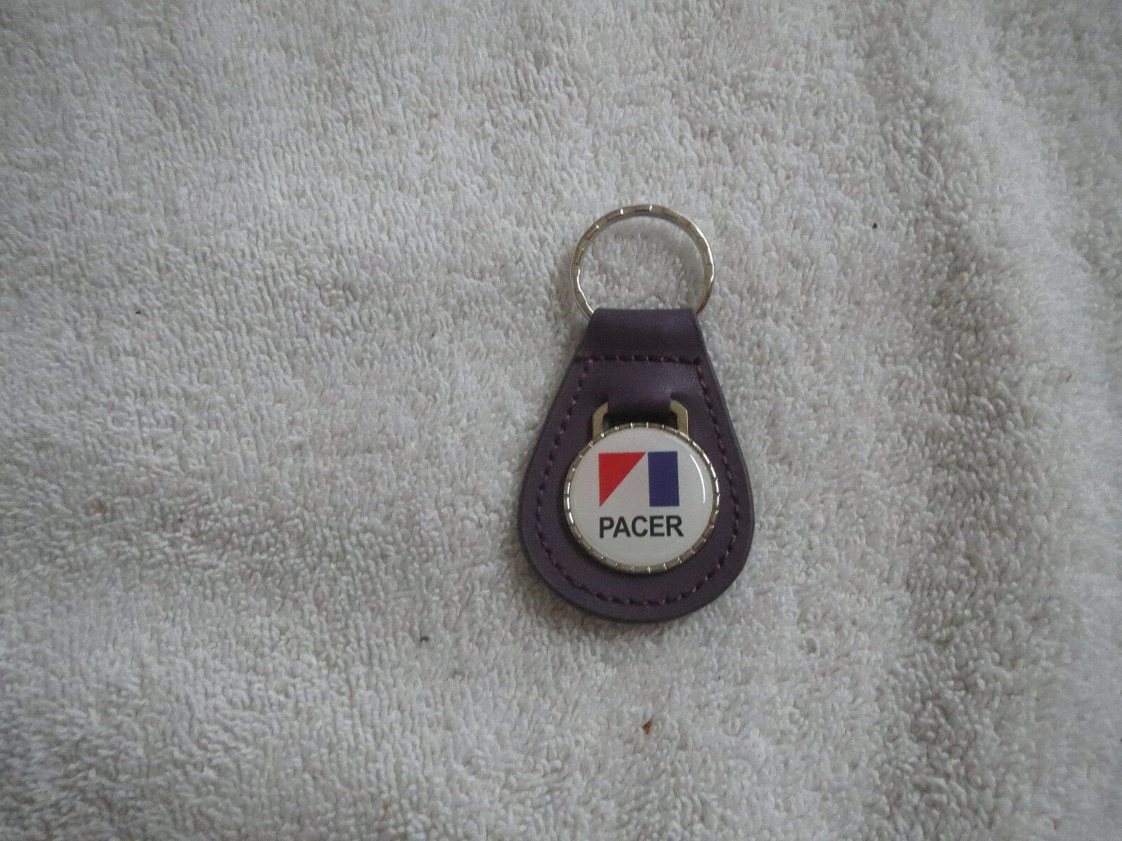 1975 1976 1977 1978 1979 AMC PACER LOGO EMBLEM LEATHER KEYCHAIN - PURPLE