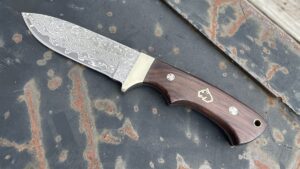 puma xp blacktail damascus jacaranda wood hunting knife with leather sheath