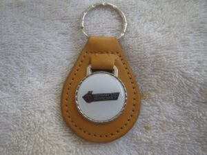 1982-1987 regal gran national gran sport logo leather keychain - orange