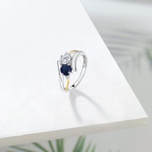 Gem Stone King 925 Silver and 10K Yellow Gold White Moissanite and Blue Sapphire and White Moissanite 2-Stone Crossover Ring For Women (1.12 Cttw, Size 7)