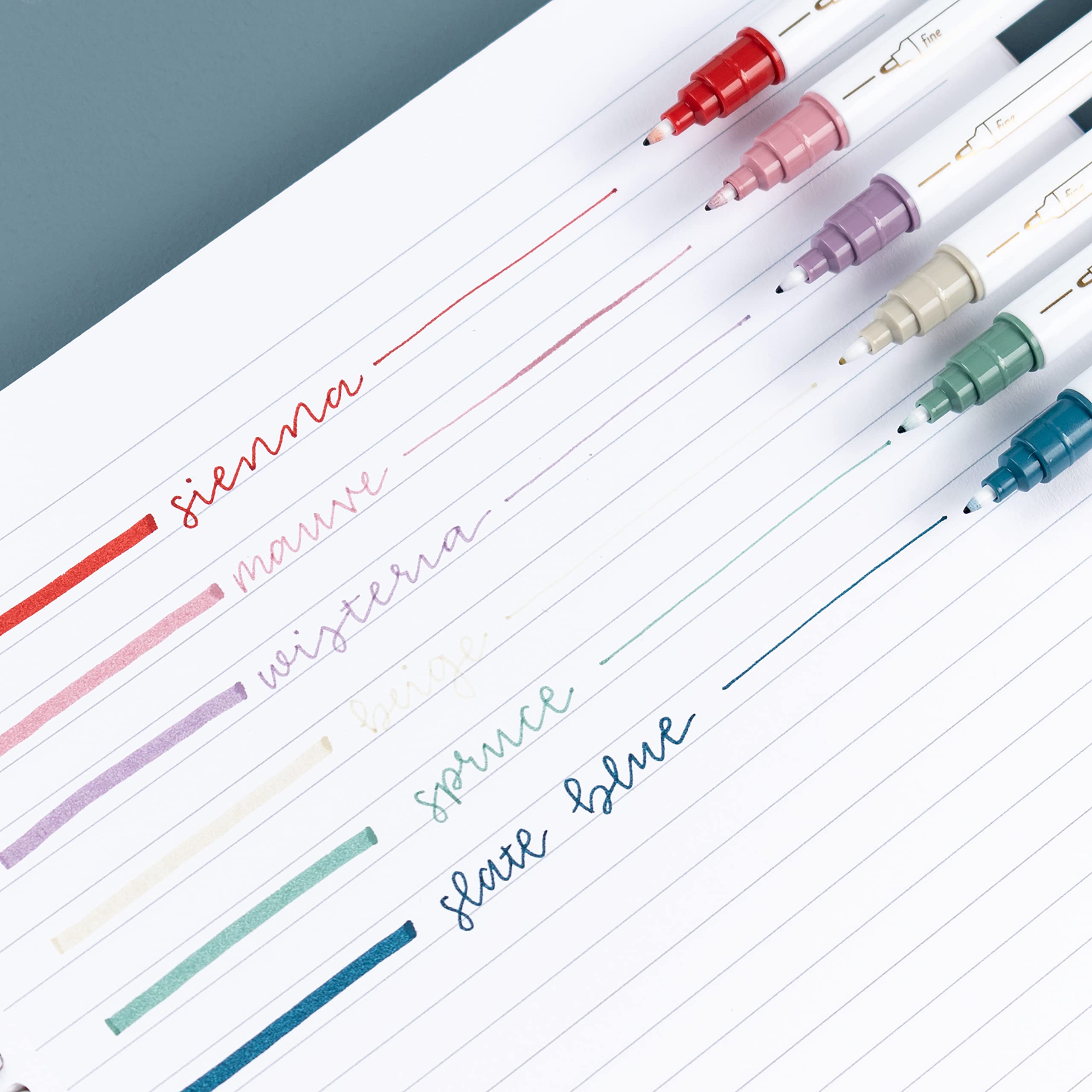 Erin Condren 6-Pack Dual-Tip Marker Set - Earth Tones. Focused Collection. Fine Tip and Medium Tip. Writing and Drawing Markers. Sienna, Mauve, Wisteria, Beige, Spruce, and Slate Blue Colors