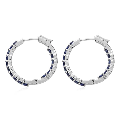 Femme Luxe created blue sapphire gemstone Inside-Out hoop earrings in silver, September birthstone.