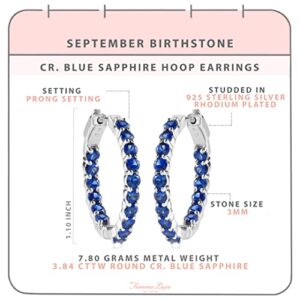 Femme Luxe created blue sapphire gemstone Inside-Out hoop earrings in silver, September birthstone.