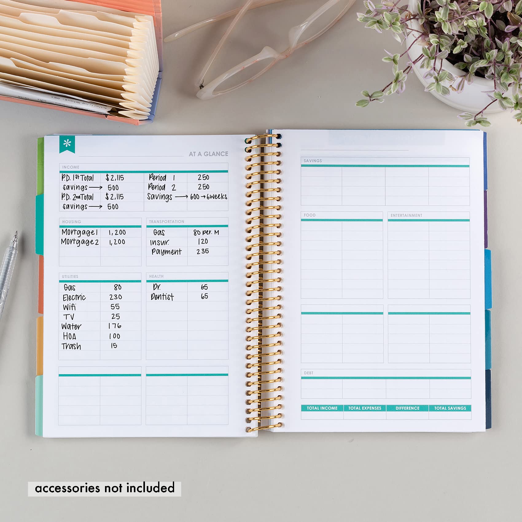 A5 Spiral - Bound Budget Planner. Savings Tracker, 72 Month-At-A-Glance Pages and 4 Pages of Debt Trackers. 13 Tabs. 160 Pages of Thick 80 Lb. Mohawk Paper. Sticker Sheet Included by Erin Condren.