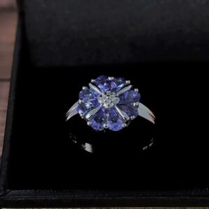 KOKAV 925 Sterling Silver Pear Shape Tanzanite Diamond Accent Flower Ring, Size 8