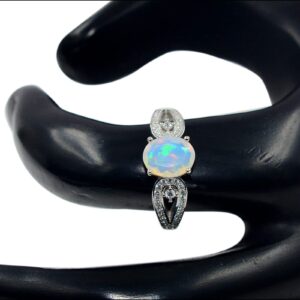 925 Sterling Silver Natural Ethiopian Welo Cut Opal 9X7 MM Oval October Birthstone Solitaire Unisex Proposal Ring For Engagement Gift (Rhodium Plated Silver, 7.5)