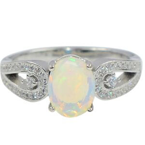 925 Sterling Silver Natural Ethiopian Welo Cut Opal 9X7 MM Oval October Birthstone Solitaire Unisex Proposal Ring For Engagement Gift (Rhodium Plated Silver, 7.5)