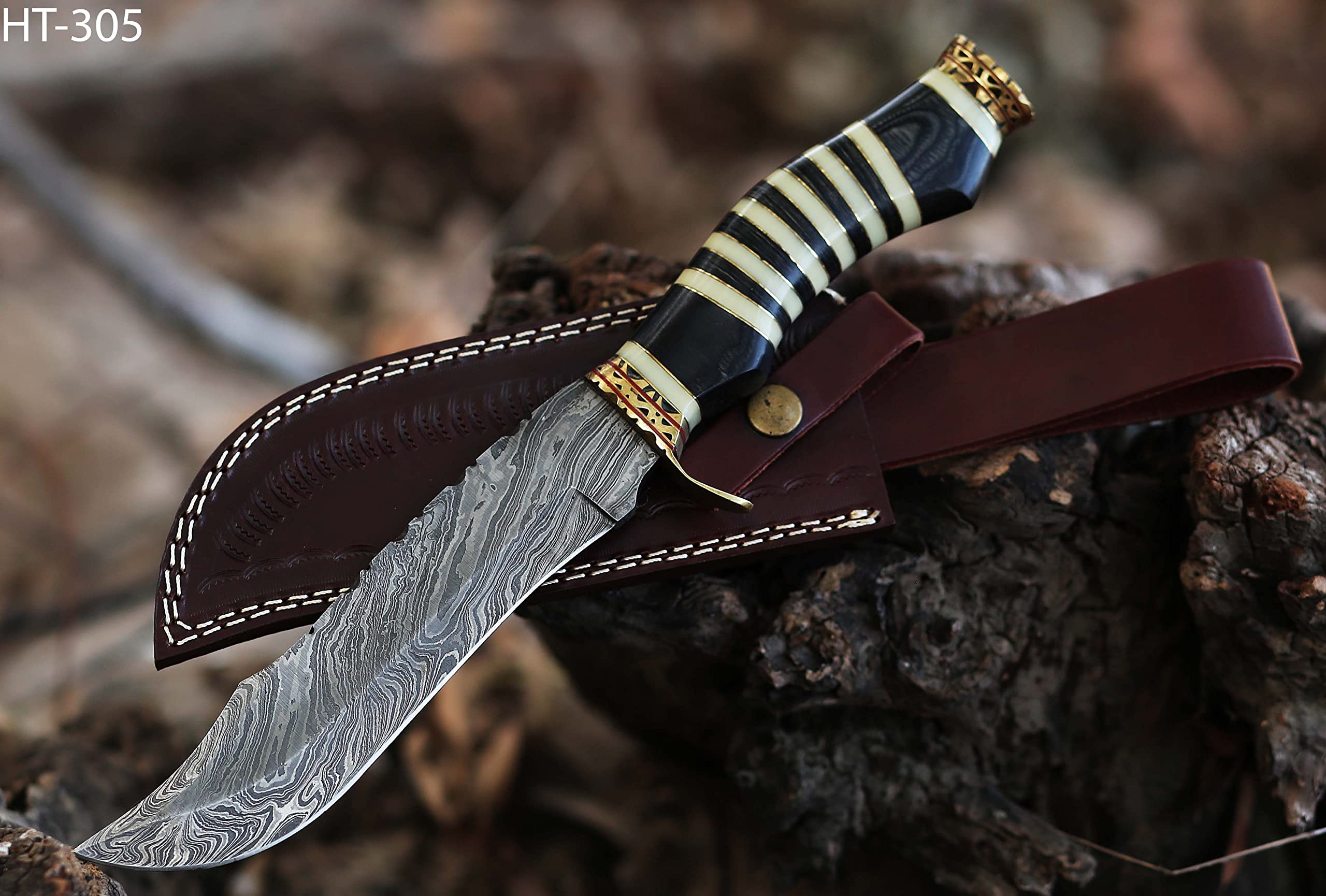 12.5 Inch long Hunting knife, Collectible knife, Scale is made of Camel bone and dollar wood, embellished with Engraved brass finger guard and pommel, Hand forged Twist pattern Damascus steel blade, Comes with Leather sheath