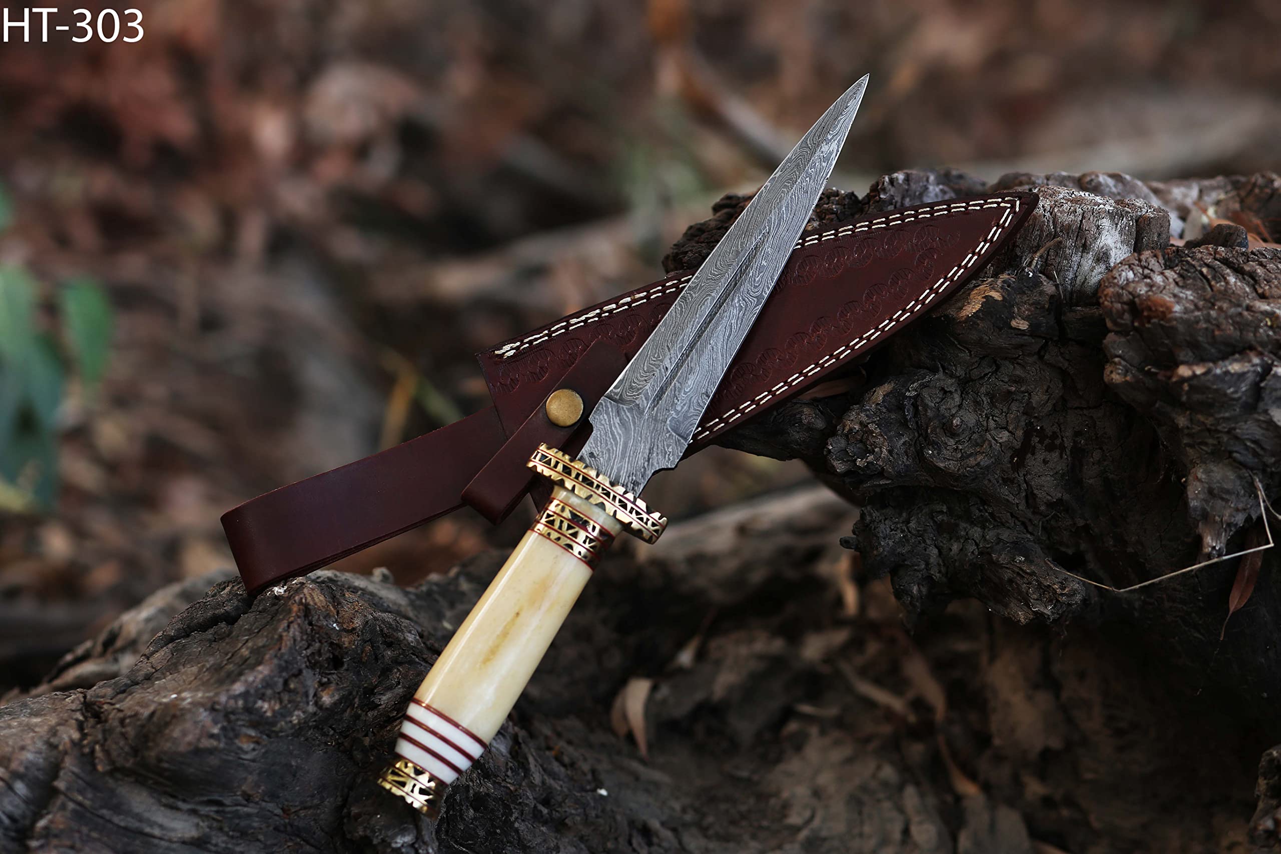 12.5 Inch long Hunting knife, Collectible knife, Natural Camel bone scale embellished with engraved brass finger guard, foil work spacer and pommel, Hand forged Twist pattern Damascus steel blade, Comes with Leather sheath