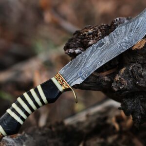 12.5 Inch long Hunting knife, Collectible knife, Scale is made of Camel bone and dollar wood, embellished with Engraved brass finger guard and pommel, Hand forged Twist pattern Damascus steel blade, Comes with Leather sheath