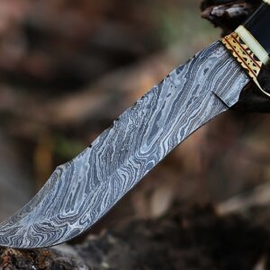 12.5 Inch long Hunting knife, Collectible knife, Scale is made of Camel bone and dollar wood, embellished with Engraved brass finger guard and pommel, Hand forged Twist pattern Damascus steel blade, Comes with Leather sheath