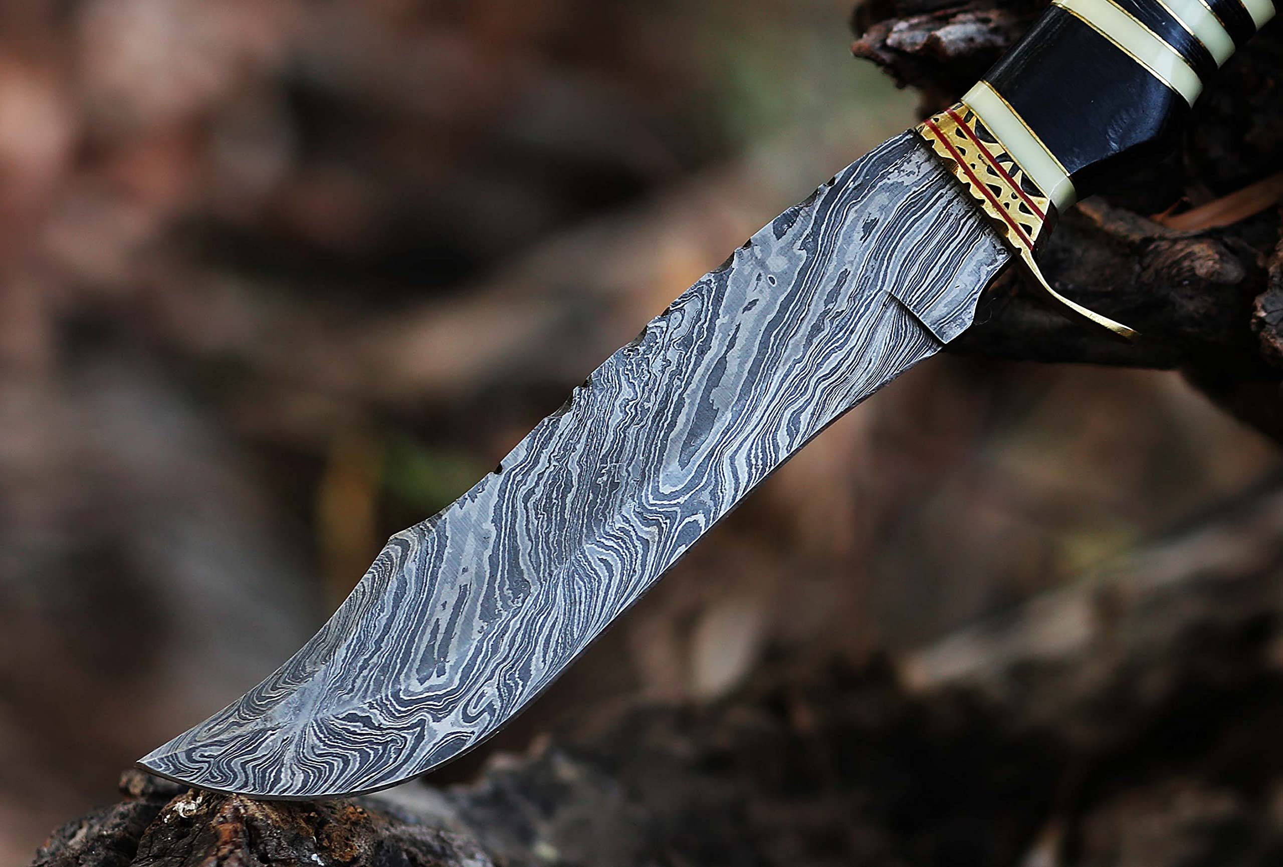 12.5 Inch long Hunting knife, Collectible knife, Scale is made of Camel bone and dollar wood, embellished with Engraved brass finger guard and pommel, Hand forged Twist pattern Damascus steel blade, Comes with Leather sheath