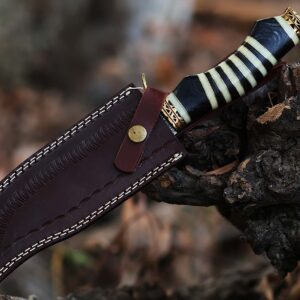 12.5 Inch long Hunting knife, Collectible knife, Scale is made of Camel bone and dollar wood, embellished with Engraved brass finger guard and pommel, Hand forged Twist pattern Damascus steel blade, Comes with Leather sheath