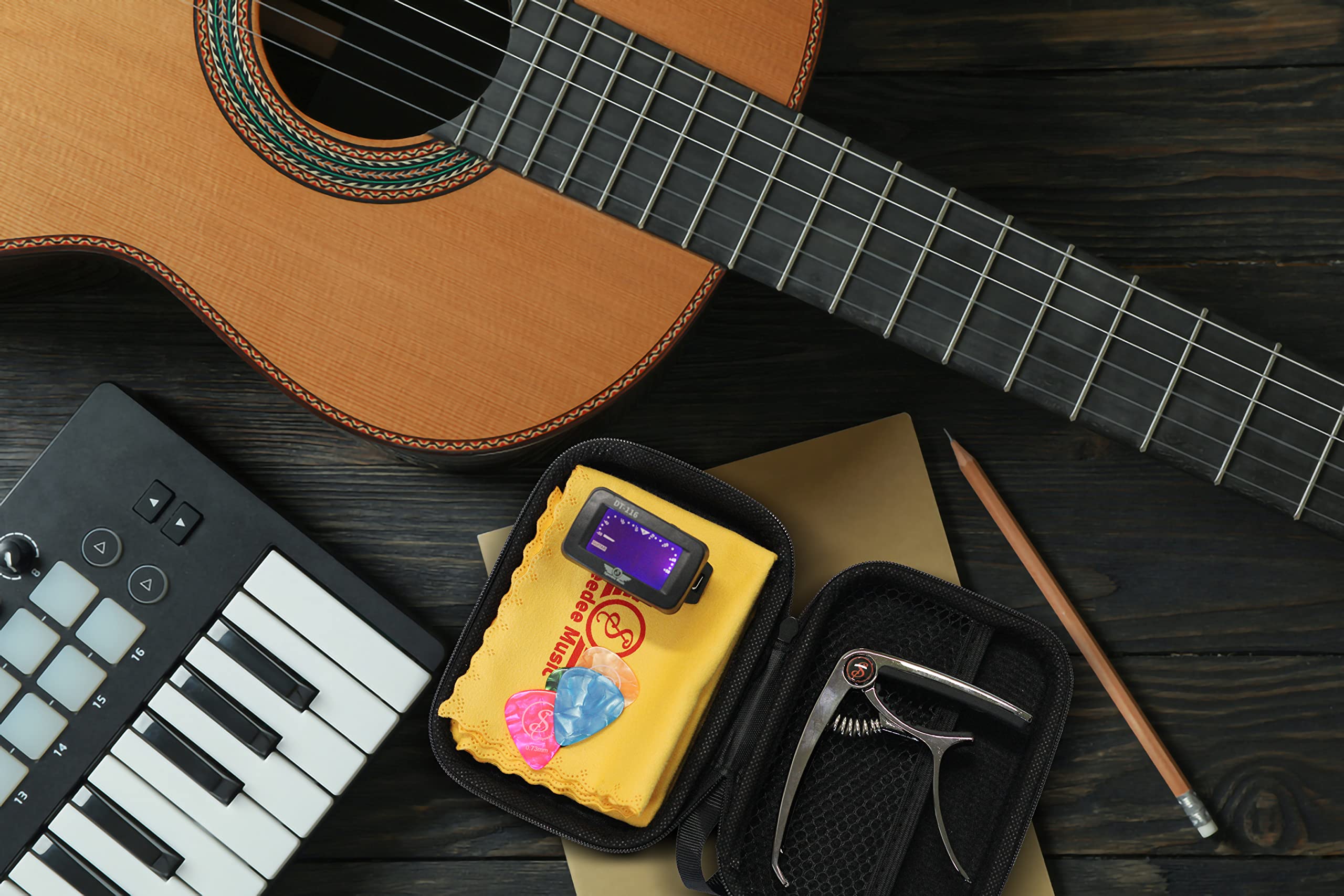 Speedee Music Capo Bundle Gift Pack - 4 Assorted Guitar Picks, Guitar Tuner, 3-1 Capo with Built-in Pick Stand and Pin Puller, Storage Bag for Guitar Accessories