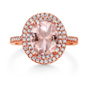 Gem Stone King 18K Rose Gold Plated Silver Peach Nano Morganite and White Moissanite Halo Engagement Ring (2.43 Cttw, Oval 9X7MM, Available In Size 5, 6, 7, 8, 9)