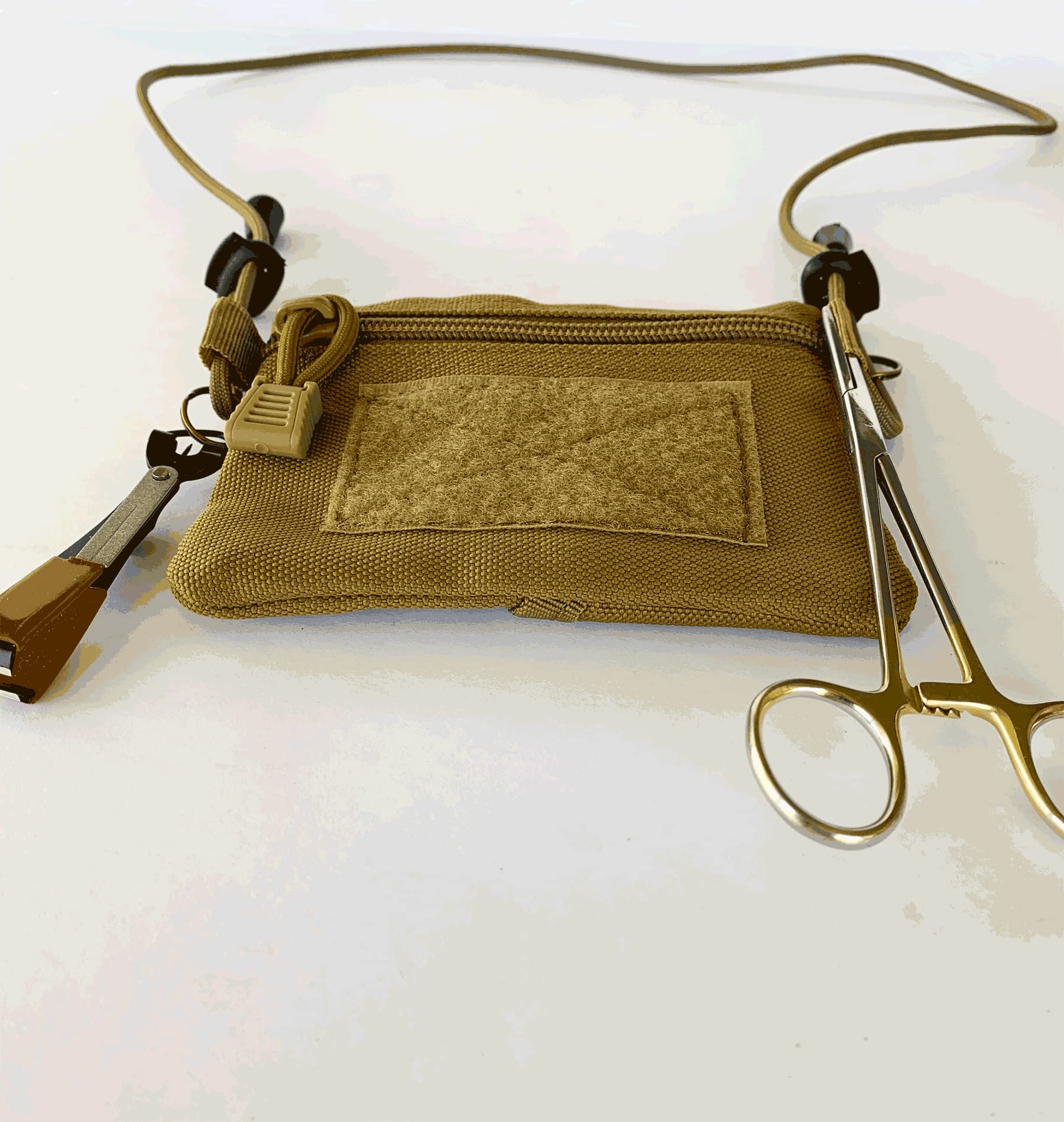 River Canyon - Pouch Lanyard with Nippers - This Fly Fishing Lanyard has a Water-Resistant Zipper Pouch, Nippers are Also Included. There is a Loop to Hang Your hemostat. Two More Rings to Hang Tools